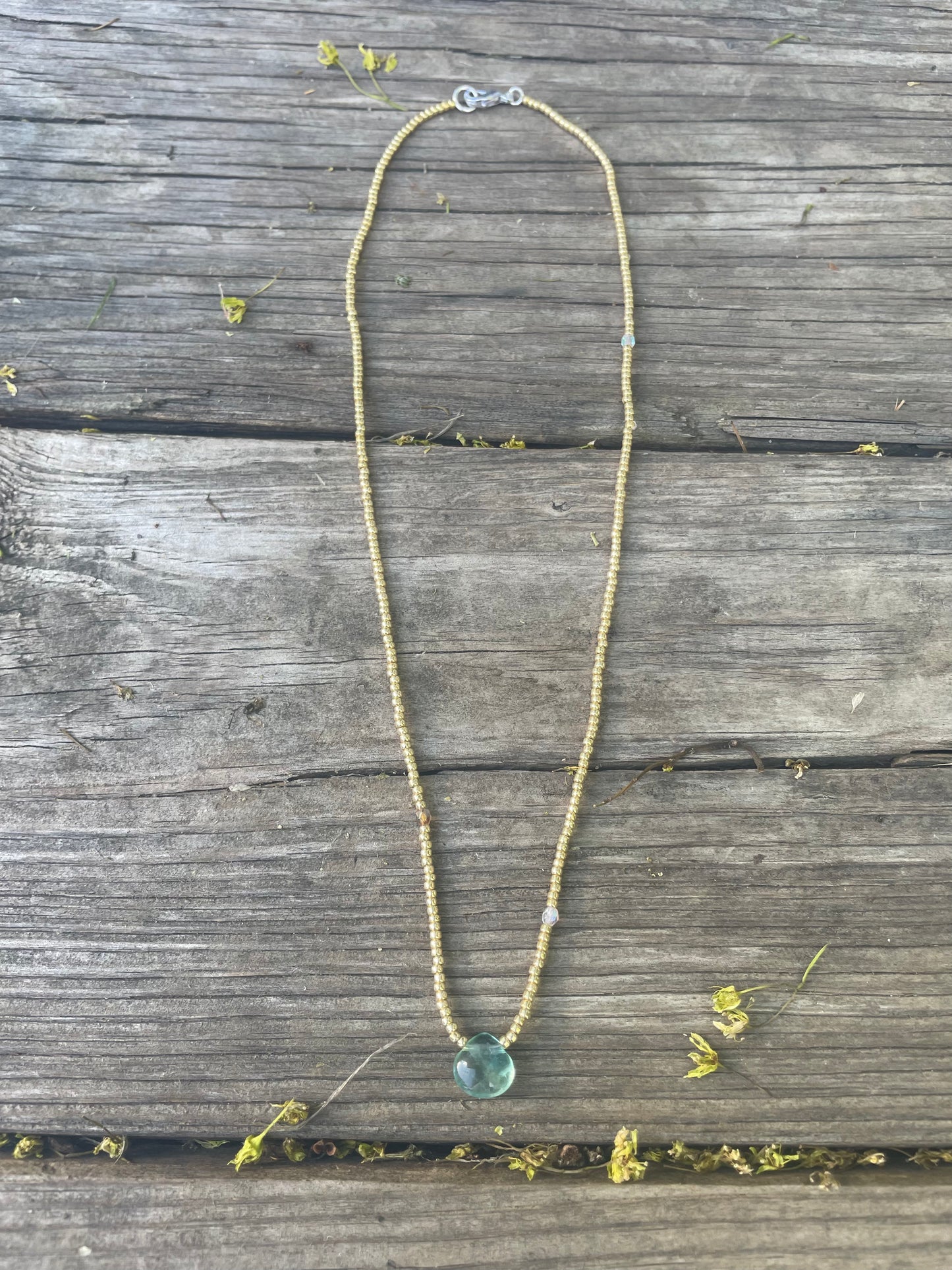 Teal fluorite and gold beads necklace