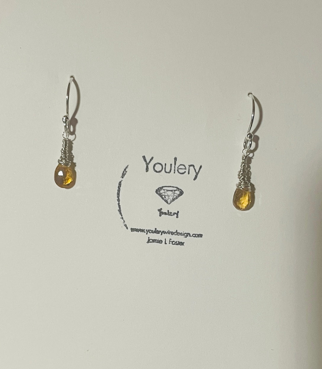 Yellow hued sapphire earrings