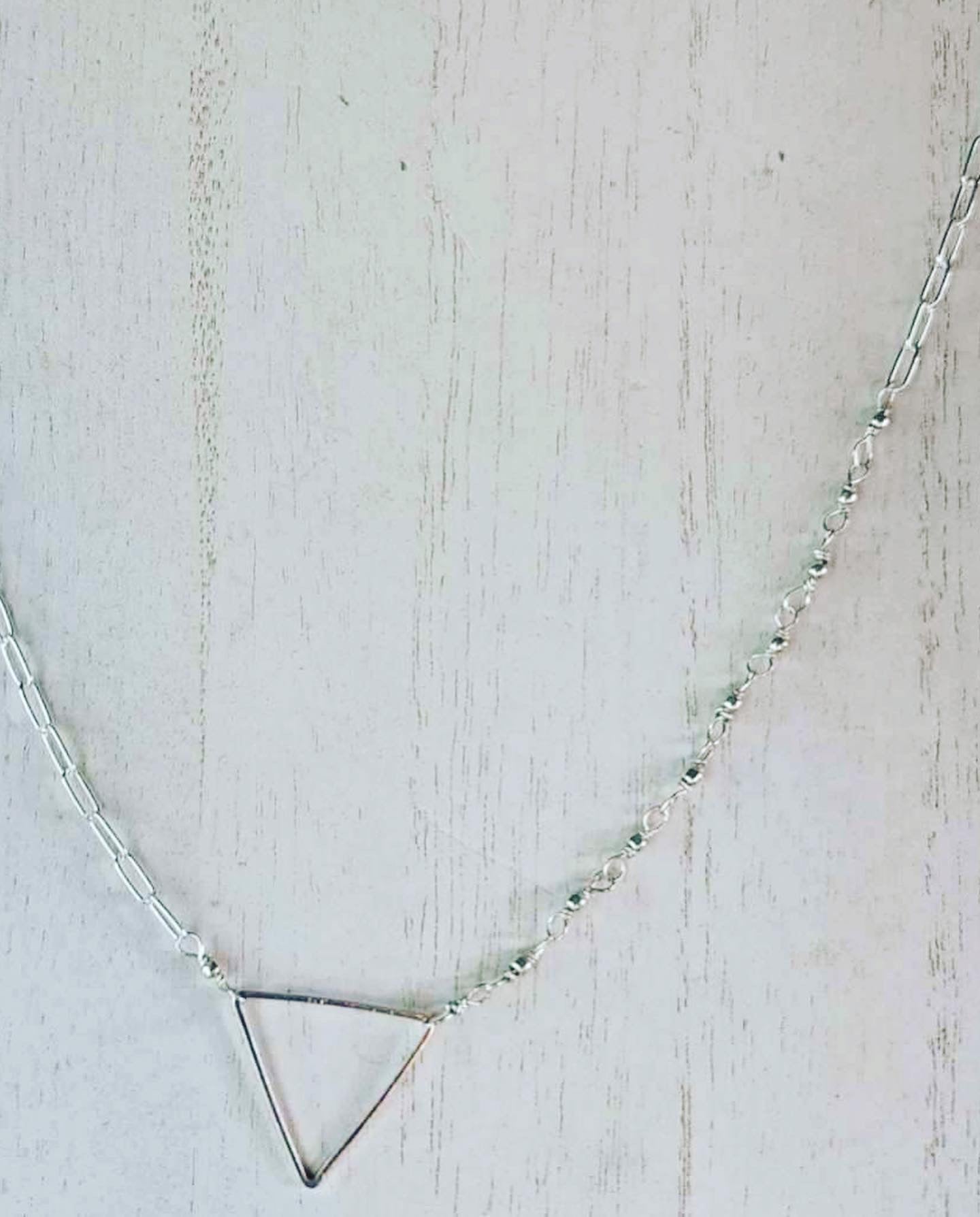 Paperclip chain necklace with geometric charm