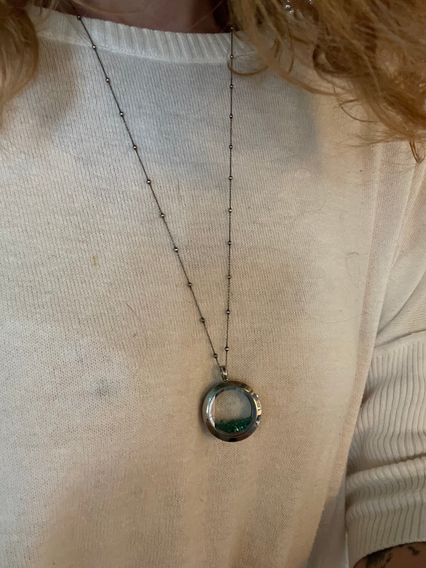 Loose green gemstone locket necklace