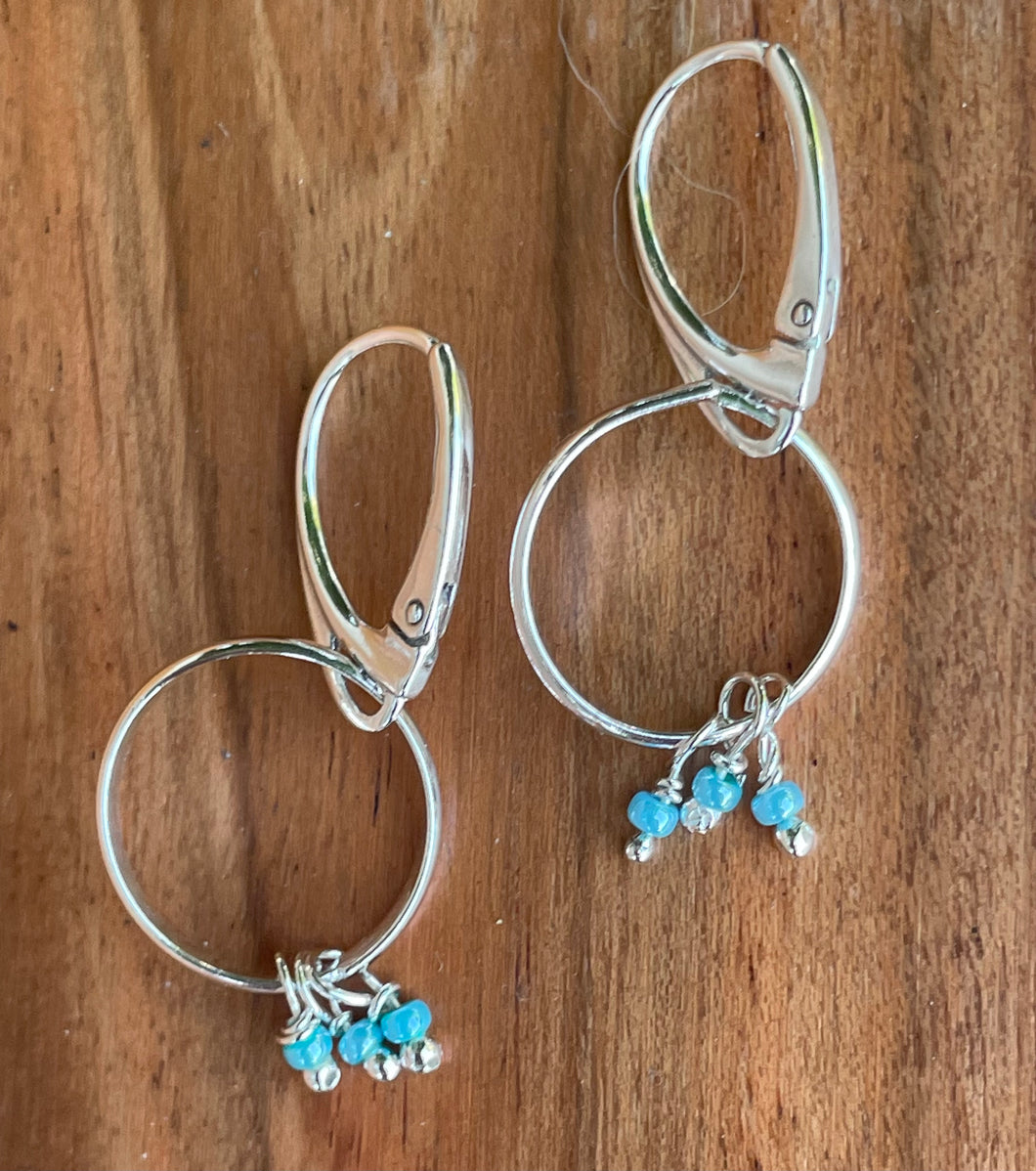 Blue beaded hoop earrings